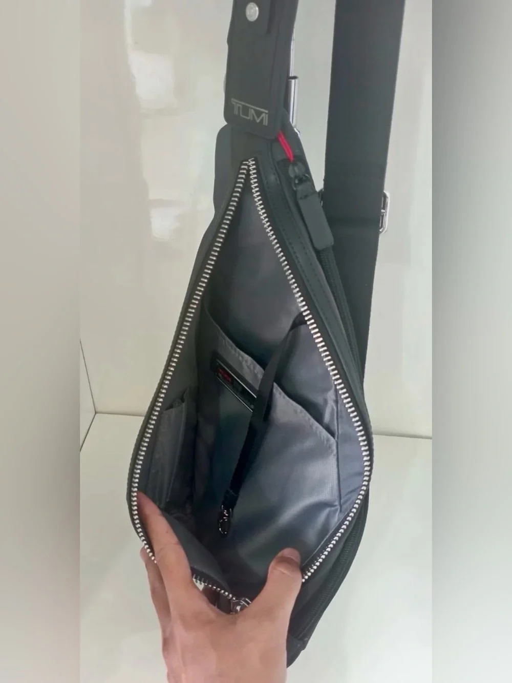 Tumi Black Sling Crossbody Bag with Silver Hardware